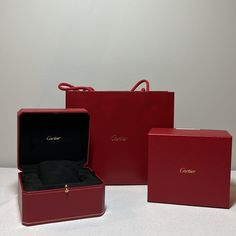 Brand New Only Used Once For Original Cartier Purchase There Are 3 Items That Come With This Set And They Are All Shown In The Photo: Watch Case Watch Box Cartier Shopping Bag Watch In Photo Is Not Included With This Set Also Available: Cartier Ring Box Set: Https://Poshmark.Com/Listing/Cartier-Ring-Case-Ring-Box-And-Bag-Set-64581a5e17fb4bafa3eb0485 Cartier Rectangular Jewelry For Gift, Luxury Jewelry With Gift Box, Timeless Red Jewelry For Formal Occasions, Elegant Cartier Jewelry For Valentine's Day, Luxury Jewelry Gift With Original Box, Luxury Jewelry Gift In Original Box, Timeless Jewelry In Original Box For Gift, Timeless Jewelry In Original Box As Gift, Luxury Formal Jewelry With Gift Box