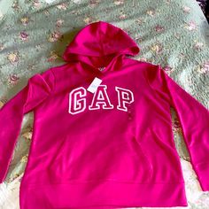 Nwt Hoodie By The Gap Color Is A Deep Pink Size Xs Or A Kids L-Xl Measurements Are: Chest 19in Across & 23in Length This Would Make A Lovely Gift!! Thanks For Looking Gap Sporty Top With Drawstring Hood, Sporty Gap Top With Drawstring Hood, Gap Hoodie Sweatshirt With Adjustable Hood, Gap Cotton Hooded Top, Gap Hooded Top With Drawstring, Gap Hooded Top With Drawstring Hood, Gap Hoodie With Letter Print, Gap Winter Tops With Letter Print, Gap Tops With Letter Print For Winter