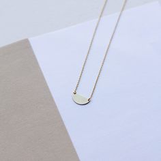 "HALF MOON NECKLACE A dainty gold chain necklace with a small half circle pendant in 9K or 14K solid gold. Minimalist design, delicate necklace ideal for everyday wearing, layered with other necklaces. This semicircle necklace is a great choice for a Mothers Day gift for mom. F E A T U R E S * Metal: High-quality Solid Gold 9K or 14K * Color: Yellow Gold, White Gold, Rose Gold * Dimensions: 15 x 7mm * Length: 16\" to 19.5\" (40cm to 50) Solid Gold jewelry is the best choice if you want your jewe Minimalist Half Moon Necklace With Adjustable Chain, Elegant Everyday Half Moon Necklace, Minimalist Moon Shaped Jewelry In 14k Gold, Minimalist Jewelry With Adjustable Half Moon Chain, Minimalist Moon Shaped 14k Gold Jewelry, Minimalist 14k Gold Moon Jewelry, Dainty Yellow Gold Half Moon Necklace, Minimalist Crescent Necklaces For Everyday, Everyday Minimalist Crescent Necklaces