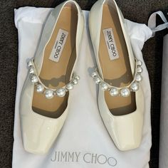 Jimmy Choo Ade Pearl Embellished Patent Leather Bridal Flats - Women’s Size 39. These Shoes Were Originally Purchased For $795. They Have Only Been Worn Once For A Bridal Shower Event, And Are In Like New Condition. The Only Noticeable Sign Of Wear Is On The Bottoms Of The Shoes. Shoes Come With The Original Jimmy Choo Box And Dust Bag. They’re Really Comfortable And I Got So Many Compliments On Them! Im Only Selling As I Don’t Have Many Occasions To Wear Them Now That Our Wedding Is Over. Jimmy Choo Flats, Bridal Flats, Plan My Wedding, Jimmy Choo Shoes, Color Ring, Womens Flats, Loafer Flats, Flat Shoes Women, Patent Leather