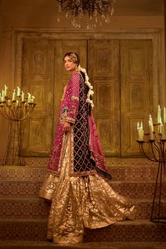 Pakistani Wedding Dress in Farshi Gharara Kameez Style is a traditional masterpiece that gives you a chic look on the big day. Luxury designs and fine details make this Gharara Dress an epitome of beauty and your priority for the wedding. Pakistani Kameez The beautiful Kameez in an alluring hot pink color is emblazoned with graceful goldwork. Hand-crafted details of tilla, sequins, mukaish, Resham, Gota, and intricate designs give an alluring look to the perfectly stitched kameez. Farshi Gharara Farshi Gharara Pakistani Simple, Gharara Pakistani Simple, Farshi Gharara Pakistani, Chatapati Gharara, Farshi Gharara, Gharara Pakistani, Pakistani Kameez, Gharara Dress, Kameez Style