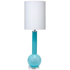 a blue glass table lamp with a white shade