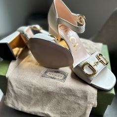 White Leather Gucci Sandal, With Gold-Toned Headware, Metal Plated Heel, Leather Sole And Ankle Buckle Closure. 3.7” Heel Height, Never Worn. Gucci Sylvie, Gucci Sandals, Gucci Floral, Gucci Heels, Shoes Gucci, Gucci Horsebit, Caged Sandals, Swim Shoes, Kitten Heel Pumps