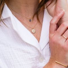 Three white diamonds dance around this celestial necklace. Beautiful hand engraving adds rich detail around each sparkling diamond.Metal: 14k yellow, 14k rose gold (inquire for white gold)Stone: three white diamonds ~ .03cttwDimensions: 18-20"; 12mm pendantChain: 1mm 14k yellow gold cable chainFinish: matte Celestial Necklace, Sparkling Diamond, Gold Stone, White Diamonds, Staple Pieces, Hand Engraving, Beautiful Hand, Diamond White, Jewelry Collection