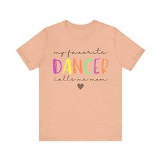 DANCE MOM T-SHIRT Buttery Soft Bella & Canvas Unisex Adult Sizing - See Size Chart PRINT This is Direct-To-Garment printed item, will not peel or crack like vinyl. The ink is printed INTO the fabric, not sitting on top of it. WASHING INSTRUCTIONS Wash inside out, cold water, gentle Tumble dry low or air dry Do not use bleach or fabric softeners. Avoid ironing on the design, do not dry clean. SIZE See specific sizing chart in photos These are unisex and not ladies or fitted. If you want a more fitted look, size down. RETURNS OR EXCHANGES All shirts are custom printed for you, we do not accept returns or exchanges. If there are any issues with this product, please feel free to message me. THANK YOU for shopping TOP MOUNTAIN DESIGNS! Stretch Cotton T-shirt For Dance Class, Pre-shrunk Short Sleeve T-shirt For Dance, Stretch Crew Neck T-shirt For Dance, Graphic Tee For Dance Class With Short Sleeves, Graphic Tee T-shirt For Dance Class With Short Sleeves, Graphic Tee Short Sleeve T-shirt For Dance Class, Graphic Tee With Short Sleeves For Dance Class, Pink Crew Neck T-shirt For Dance, Casual Stretch T-shirt For Dance Class