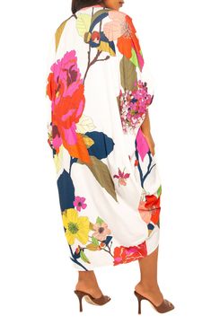 Enter the tropics everytime you slip into this vivid floral dress boasting a billowy caftan silhouette that's fit for your next paradise venture. V-neck Bracelet-length sleeves Unlined 95% polyester, 5% spandex Hand wash, line dry Imported Neck Bracelet, Maxi Sundress, Bold Floral Print, Designer Drapes, Caftan Dress, Long Shirt Dress, Kaftan Dress, Long Sleeve Shirt Dress, Shop Maxi Dresses