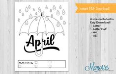 an open umbrella with the word april on it