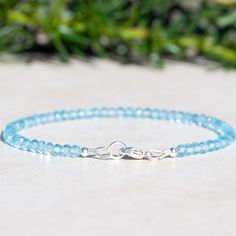 Blue Topaz Gemstone Beaded Bracelet Introduction This exquisite Blue Topaz Gemstone Bracelet offers a hint of elegance and sophistication that sets it apart from the crowd. Crafted with premium materials, this bracelet is a shining testament to luxury and style. Note: The product images are magnified to showcase fine details. This is a thin bracelet. Product Details Blue Topaz Gemstones: The blue topaz beads measure approximately 3.5mm each. Closure: Features a lobster clasp for secure wearing. Silver Gold Christmas, Blue Topaz Bracelet, A Pug, Blue Topaz Gemstone, Custom Gift Boxes, Gemstone Beaded Bracelets, Unique Handmade Jewelry, December Birthstone, Custom Bracelets