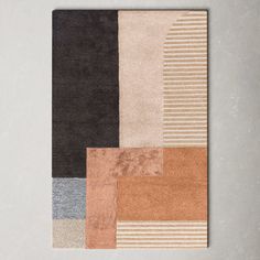 an area rug with different colors and shapes