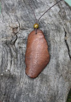 "A rare find, this outstanding and unique natural Red Cedar Tree Bark pendant have been made for you, or a loved one, in my studio on the West of Ireland. As I was walking the grounds of the old Ashford Castle in County Mayo (dating to 1228), I came across this amazing red cedar tree surrounded by its fallen thick bark....I could only find beauty in the few pieces I picked up and I knew I would work them into unique pieces of jewelry. This large Irish Tree Bark Necklace is the perfect keepsake g Red Nature-inspired Jewelry For Gifts, Nature-inspired Pendant Jewelry For Crafting, Handmade Red Nature-inspired Necklace, Nature-inspired Brown Jewelry For Jewelry Making, Natural Spiritual Jewelry As A Gift, Brown Necklace With Large Pendant For Gift, Brown Necklace With Large Pendant As Gift, Rustic Brown Pendant Jewelry, Artisan Carved Necklaces As A Gift