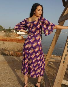 Long 70s dress in purple floral print. Square neckline. Wide short sleeves. Rear zipper. Size S, EU 34-38 / UK 6-10 Measurements: 32"/ 81cm bust - 26" / 66cm waist - 36" / 91cm hips - 16" / 41cm sleeve length - 49" / 124cm dress length. Condition - Excellent. Material - Polyester. Sustainability - Vintage. Handpicked, repaired and ready to wear. This is an original vintage item, not new and minor signs of wear and age are expected, we will highlight any major flaws. Model is a UK 6/8 and 5'7" tall Summer Dresses Maxi, Women Summer Dresses, Purple Floral Print, Jumpsuit Skirt, Vestidos Vintage, 70s Dress, Sleeveless Jacket, Floral Dresses, Purple Floral