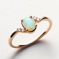 Opal ring for women gold, sterling silver opal ring vintage opal ring white gold, opal jewelry Opal Ring for Women - Vintage Gold and Sterling Silver Opal Jewelry Description: Elevate your style with our exquisite Handmade Opal Ring for Women, meticulously crafted to capture the timeless allure of opals. Available in both classic sterling silver and elegant gold, this vintage-inspired piece is a true testament to opal's natural beauty. Specifications: Material: Solid 925 sterling silver / Gold Plated and also available in solid gold  Stone: High-Quality Natural Ethiopian Opal Metal Options: Sterling Silver, White Gold Sizes Available: All sizes available  Key Features: High-Quality Opal: Our opals are handpicked for their mesmerizing play of colors, ensuring each ring is a unique masterpie Gold Opal Jewelry, Vintage Opal Ring, Ring For Women Gold, Opal Ring Vintage, Sterling Silver Opal Ring, Jewelry Opal, Silver Opal Ring, Ring White Gold, Gold Stone