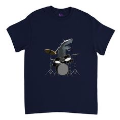 Introducing the Shark Playing the Drums Heavyweight Unisex Crewneck T-shirt. This shirt is perfect for anyone who wants to show off their love for music and sharks in a unique and fun way. The design features an illustrated shark playing drums The shirt is made from a heavyweight cotton material that is durable and comfortable to wear, making it perfect for everyday wear or for special occasions. The crewneck design and unisex cut make it versatile and suitable for all genders. Show off your lov Shark Tshirts, Playing The Drums, Playing Drums, The Drums, Shark Shirt, Crewneck Design, The Shark, How To Clean Iron, Art And Technology