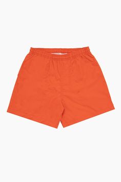 This classic cut men's swim trunk is fully lined with our comfort mesh liner. Unlike traditional swim trunks, our liner extends to the bottom of the shorts, which have a 4.5" inseam. This style features 2 deep side pockets and one back pocket with eyelets for drainage and a velcro seal so the shorts are functional in and outside of the pool. Also features a drawcord on the inside to adjust the waistband. This product is 100% Made in U.S.A. and NAFTA compliant. Made in South Central, Los Angeles. Swim Pants, South Central, Cute Pants, Orange Shorts, Mens Swim Trunks, Off White Color, Man Swimming, Blue Moon, Bright Orange