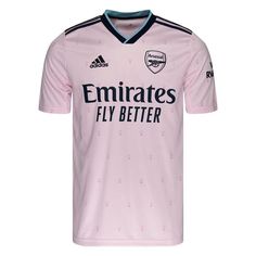 PRICES MAY VARY. 100% Polyester Imported Pull On closure Machine Wash Regular fit Ribbed V-neck Arsenal woven crest Mesh inserts under arms Vibrant colors. Classic club DNA. A background detail on Arsenal's late-20th-century badge, the humble ermine tail returns in the eye-catching print on this adidas soccer jersey. The pink hues are borrowed from the crest on the Royal Arsenal Gatehouse in Woolwich, the club's birthplace. Made for fans, this shirt combines moisture-absorbing AEROREADY and soft Arsenal Football Shirt, Adidas Soccer Jersey, Arsenal Shirt, Arsenal Soccer, Arsenal Jersey, Football Jersey Shirt, Adidas Store, Soccer Outfits, Classic Football Shirts