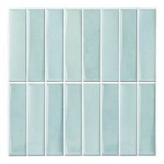 the back side of a glass tile wall with several different shades of blue and white