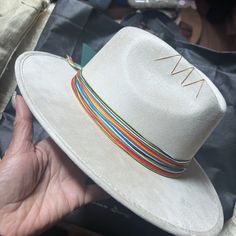 Brand New With Tags And Original Bag. This Is 100% Handcrafted Hat Made Of Flat Suede With Details Of Colored Thread. (Unisex). Size - Medium {22.04 - 22.83 Inches} - Not Small - In White Cream Color. Link_ Https://Tuluminati.Global/Products/Cheel This Hat Is Brand New, Never Worn. They Do Not Accept Returns. They Are Based In Mexico And Hat Was Handmade In Mexico. Very Beautiful Hat. Unfortunately, It Fits Too Big On Me. It's Stylish, Clean, And Cool. The Company Is Based In Mexico; It Doesn't White Fedora Panama Hat For Festivals, White Brimmed Fedora For Festival, White Fedora With Short Brim For Festivals, White Short Brim Fedora For Festival, White Curved Brim Fedora For Festival, White Fedora Felt Hat For Festival, Handmade White Wide Brim Felt Hat, Suade Hat, Sombrero Hat