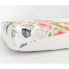 an image of a flowered pillow on a white background