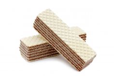 three wafers stacked on top of each other with one piece cut out to show the texture