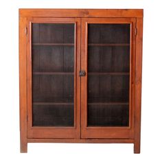 an old wooden bookcase with glass doors