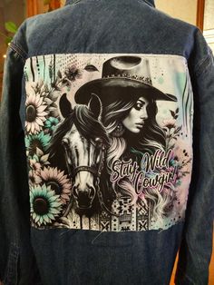 - Medium unisex size - Legendary Whitetails brand - "Stay Wild Cowgirl" print - Color of the shirt as pictured - Two front chest pockets - Snap Button front - 100% cotton shirt.   - Shirt is brand new with a custom-made patch...one of a kind!   - Custom print fabric back patch (lightweight cotton).  The patch will fray some after future washings.  Makes it even more unique:) - Perfect layering piece.  Great over a turtleneck, t-shirt, or tank top.  I am a small/medium build and I love wearing an Cotton Denim Jacket With Graphic Print, Medium Wash Long Sleeve Denim Jacket With Graphic Print, Western Cotton Denim Jacket For Spring, Western Style Cotton Denim Jacket For Spring, Spring Western Cotton Denim Jacket, Spring Western Style Cotton Denim Jacket, Custom Artwork Long Sleeve Cotton Denim Jacket, Long Sleeve Cotton Denim Jacket With Custom Artwork, Casual Denim Jacket With Custom Artwork For Fall