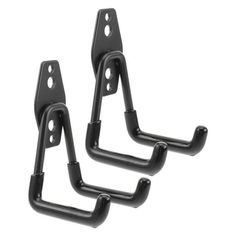 two black metal brackets on white background