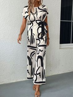 Embrace modern elegance with this Simple Abstract Printed 2-Piece Set. Featuring a stylish abstract print, this set includes a top and matching bottoms that offer both comfort and contemporary flair. Ideal for any casual outing or relaxed gathering, it combines simplicity with a touch of artistic expression. Beach Dresses Casual, Top With Pants, Kaftan Designs, Casual Dresses Plus Size, Simple Abstract, Womens Wide Leg Pants, Abstract Graphic, Wedding Dresses Plus Size, Pantalon Large