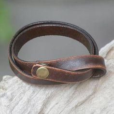 Distressed leather wrap bracelet, 'Daring in Brown' - Modern Leather Wrap Bracelet Adjustable Waxed Leather Bracelet, Classic Adjustable Braided Leather Bracelet, Leather Jewelry With Wrist Strap For Everyday Wear, Classic Adjustable Leather Bracelet For Everyday, Everyday Leather Bracelet With Wrist Strap, Elegant Adjustable Bracelets For Everyday Use, Vintage Brown Wrap Bracelet, Classic Adjustable Brown Jewelry, Adjustable Classic Brown Jewelry