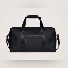 a black duffel bag with straps on the front and side, against a white background