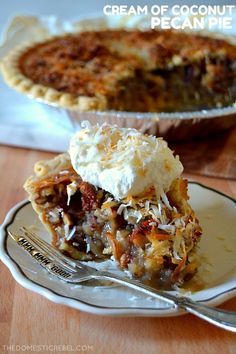 a piece of pie sitting on top of a white plate next to a silver fork