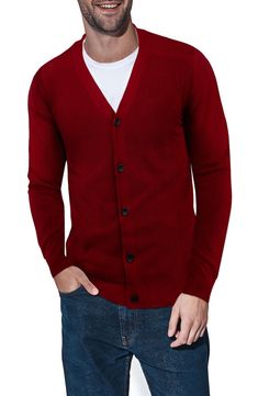 Start adding layers to your wardrobe as the weather cools down. Button up this sweater cardigan for a put-together and preppy look or leave it open to keep things casual. Fit: this style fits true to size. 29" length (size L) V-neck Long sleeves Front button closure 100% cotton Dry clean only Imported Casual Red V-neck Cardigan, Winter Button-up V-neck Sweater With Buttons, V-neck Long Sleeve Sweater With Button Closure For Layering, Winter Button-up V-neck Sweater For Work, Classic V-neck Sweater With Button Closure For Layering, Red V-neck Outerwear With Button Closure, Classic Red V-neck Sweater For Fall, Casual V-neck Sweater With Buttons For Layering, Casual V-neck Sweater For Winter Workwear