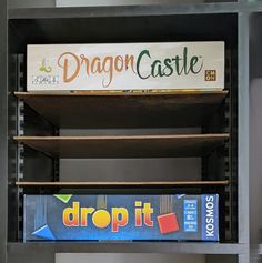 a box of dragon castle and drop it are on display