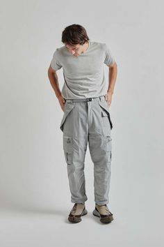 Cmf outdoor garment cargo pants - ice gray    the cargo pants are designed to maximize carrying capacity living up to their name. featuring unique thigh pockets with zippers each pocket opens to reveal three compartments allowing for vertical storage of items rather than the traditional horizontal approach. these compartments provide practical organization and easy access to your belongings fully embracing the essence of "cargo" with thoughtful design and functionality. Practical Organization, Layering Jacket, Khaki Chino Pants, Brown Oxfords, Vertical Storage, Mens Chinos, Linen Skirt, Black Sea, Khaki Chinos