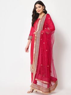 This is a beautiful 3-piece suit set. It comes with straight cut kurta with embroidery detailing on neck & sleeves has 3/4th sleeves, round neck & calf length teamed with straight solid pants and a net dupatta with heavy border. 3-piece set Color- Pink Work- Embroidery work on neck & sleeves Kurti Length - 46 inch Kurta Fabric-Cotton Silk Bottom Fabric -Cotton Silk Dupatta Fabric - Net dupatta with stone & zari work Sleeves-Full Sleeves Neck-V Neck Care - Dry Clean Straight Kurta Salwar Kameez With Embroidered Border, Straight Chanderi Kurta With Embroidered Border, Navratri Straight Kurta Palazzo Set With Embroidered Border, Chanderi Straight Kurta With Embroidered Border, Navratri Palazzo Set With Embroidered Border And Straight Kurta, Diwali Embroidered Palazzo Set With Straight Kurta, Festive Straight Kurta Sets With Embroidered Border, Navratri Palazzo Set With Embroidered Border, Chanderi Set With Embroidered Border And Straight Kurta