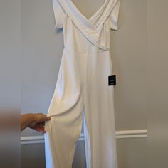 Great Pantsuit! Wide Leg; Great Design On Bodice And Back. Could Be Used For Many Events. Nwt White V-neck Jumpsuits And Rompers For Formal Occasions, White V-neck Pantsuit For Party, White Fitted Jumpsuits And Rompers For Formal Occasions, White Jumpsuits And Rompers For Spring Wedding, White Fitted Formal Jumpsuits And Rompers, White Fitted Jumpsuit For Formal Occasions, White Fitted V-neck Pantsuit, Black Silk Jumpsuit, Lulus Jumpsuit