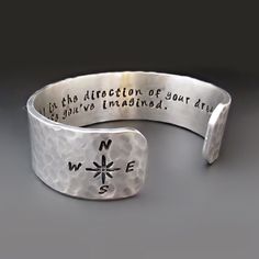 a cuff bracelet that says, it's the direction to your destination