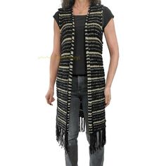 FRINGE BENEFITS! We are loving this beautiful boho open front, nubby knit duster sweater vest from Chico's. Features black knit with gold metallic stripes and a fun fringed hemline. This will add a touch of sass to any outfit. Excellent pre-owned condition. Bohemian Vest For Fall Layering, Winter Bohemian Black Vest, Fall Sleeveless Vest With Tassels, Casual Fringed Vest For Fall, Bohemian Knit Sweater Vest For Fall, Sweater Vest Black, Knit Duster, Duster Sweater, Long Duster