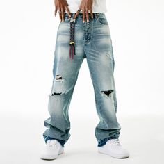 Unlock edgy and effortless style with our M ripped jeans. Made with high-quality denim, these jeans are designed to be both durable and fashionable. The distressed detailing adds a touch of edginess to your look, making them perfect for any occasion. Elevate your wardrobe with these premium jeans that exude sophistication and exclusivity. Features: -45% Cotton, 55% Polyester -Mid-Waist -Premium Denim Fabric -Regular fit -Street style Urban Dark Wash Jeans With Frayed Hem, Urban Dark Wash Jeans For Streetwear, Baggy Rigid Denim Jeans For Streetwear, Edgy Relaxed Fit Jeans For Streetwear, Ripped Washed Blue Bottoms For Streetwear, Ripped Cargo Jeans For Streetwear, Casual Ripped Streetwear Bottoms, Distressed Denim Blue Cargo Jeans For Fall, Urban Distressed Rigid Denim Cargo Jeans