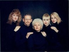 a group of people standing next to each other in front of a black background with white hair