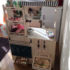 the kitchen is made out of wooden crates