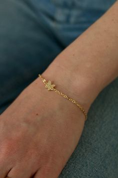 The petite CZ Pave butterfly is on a dainty 14k gold filled. Dainty Everyday Jewelry With Butterfly Charm, Promise Bracelet, Heart Jewelry, Everyday Look, Gold Filled, Bracelet, Gold