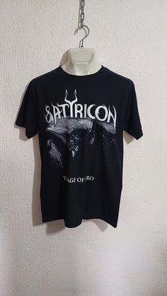 SATYRICON THE AGE OF NERO T-SHIRT New Satyricon T-Shirt High Quality We'll shipping worldwide. Shipping time range. United States = 20-25 business days Rest of the world = 25-30 business days Black Metal, Halloween Shopping, Tee Shirt, Favorite Outfit, Bathing Beauties, Tee Shirts, Adult Outfits, United States, T-shirt