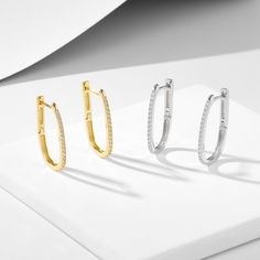 Elevate your style with our chic U Earrings, a contemporary fusion of simplicity and sophistication. Designed to frame your face with grace, these earrings feature a sleek U-shaped hoop that effortlessly adds a touch of modern elegance to any look. Crafted with meticulous attention to detail and quality, the U Earrings are versatile and timeless, making them a perfect accessory for both casual and formal occasions. Make a subtle statement with these understated yet striking earrings that capture Sterling Silver Hoop Earrings, Sterling Silver Hoops, Silver Hoops, Silver Hoop Earrings, Gold Plated Sterling Silver, Gold Plating, American Style, Jewelry Pieces, Timeless Elegance