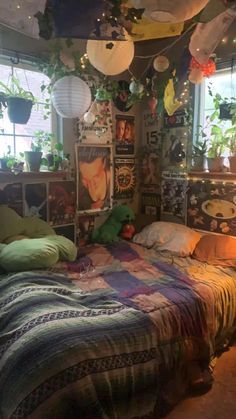 a bed room with a neatly made bed and lots of plants hanging from the ceiling