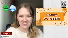 a woman is smiling for the camera with an orange happy october sign in front of her