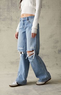 PacSun denim is back with a classic this season — the Medium Blue Ripped Low Rise Baggy Jeans! These super cute jeans sit low on the waist and feature an ultra-slouchy relaxed leg, a medium blue wash, and ripped details at the knees for some added edge. Ripped Casual Flare Jeans For Streetwear, Casual Ripped Baggy Jeans, Casual Ripped Flare Jeans For Streetwear, Casual Ripped High Waist Flare Jeans, Trendy Ripped Jeans For Everyday, Casual High Waist Ripped Flare Jeans, Trendy Ripped Flare Jeans In Rigid Denim, Casual Everyday Distressed Flare Jeans, Everyday Ripped Washed Blue Bottoms