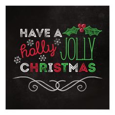 a chalkboard with holly jolly christmas written on it