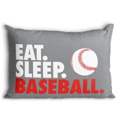 a pillow that says eat sleep baseball with a ball on the bottom and red lettering