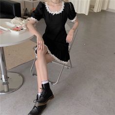 Description: An elegant black vintage gothic dress with white ruffles will be a great choice for a summer outfit, a versatile dress for both walks and stylish photo shoots on your Instagram. Material: Cotton Polyester S: Shoulder - 34cm/ Bust - 84cm/ Length - 79cm/ Sleeve - 26cm M: Shoulder - 35cm/ Bust - 86cm/ Length - 80cm/ Sleeve - 27cm L: Shoulder - 36cm/ Bust - 88cm/ Length - 81cm/ Sleeve - 28cm XL: Shoulder - 37cm/ Bust - 90cm/ Length - 82cm/ Sleeve - 29cm 2XL: Shoulder - 38cm/ Bust - 92cm Gothic Short Sleeve Dress With Lace Trim, Gothic Mini Dress With Ruffles And Short Sleeves, Black Vintage Dress For Spring Costume Party, Black Vintage Dress For Costume Party In Spring, Black Summer Cosplay Dress, Fitted Vintage Dress With Ruffles For Cosplay, Fitted Black Vintage Dress With Lace Trim, Fitted Vintage Black Dress With Lace Trim, Fitted Black Vintage Mini Dress