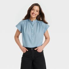 This Popover Short-Sleeve Blouse from Universal Thread™ makes a perfect pick for warm summer days. Fashioned in a casual fit, it features a front button placket and a curved hemline with side slits for relaxed style. The lightweight cotton fabric offers cool and comfortable all-day wear, and you can pair this blouse with your choice of pants or skirts to create a range of stylish outfits. Universal Thread™: Found exclusively at Target. Casual Summer Blouse With Placket, Spring Casual Blouse With Placket, Casual Spring Blouse With Placket, Spring Casual Tops With Placket, Effortless Spring Tops With Placket, Spring Tops With Placket For Daywear, Spring Placket Top For Daywear, Casual Spring Tops With Placket, Casual Button Blouse For Daywear